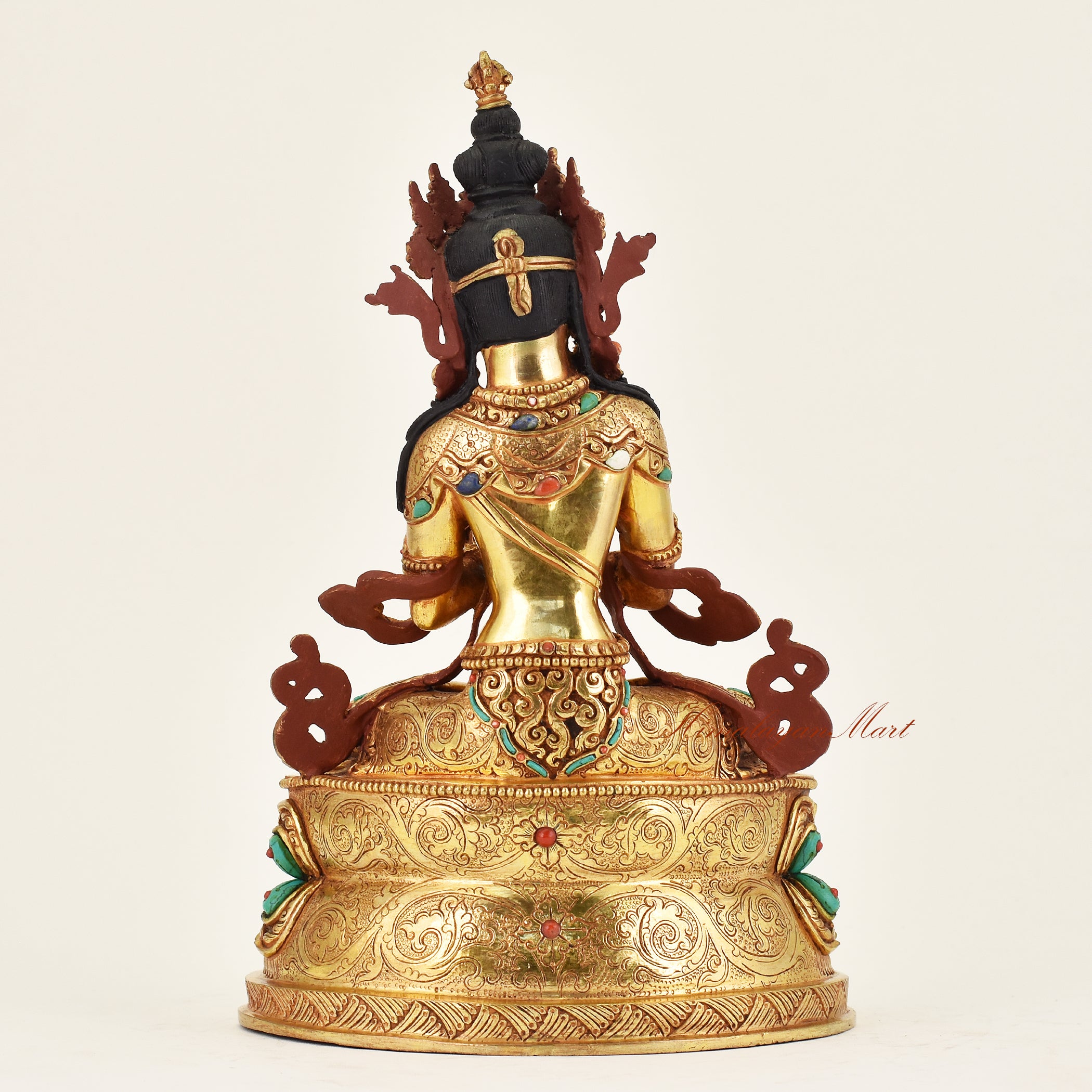Back view of handmade Nepalese Vajradhara statue displaying fine craftsmanship, traditional patterns, and spiritual iconography for meditation practice.
