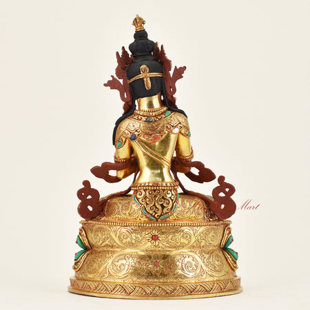 Back view of handmade Nepalese Vajradhara statue displaying fine craftsmanship, traditional patterns, and spiritual iconography for meditation practice.
