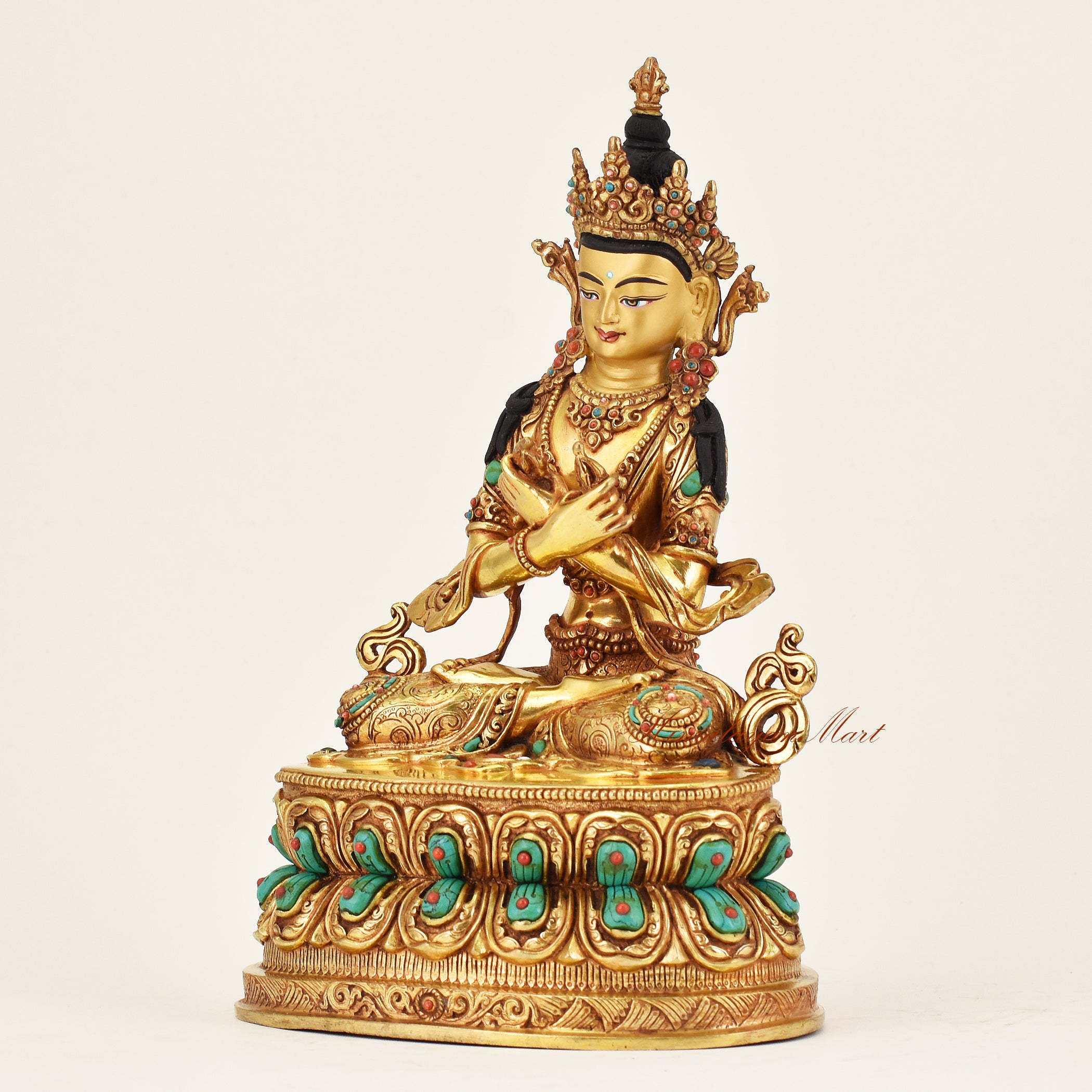 Left angle of handmade Nepalese Vajradhara statue highlighting sacred attributes and lotus base, symbolizing enlightenment and primordial wisdom.