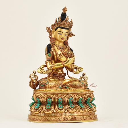 Right side view of handmade Nepalese Vajradhara statue showing intricate robes and detailed iconography representing wisdom and spiritual awakening.