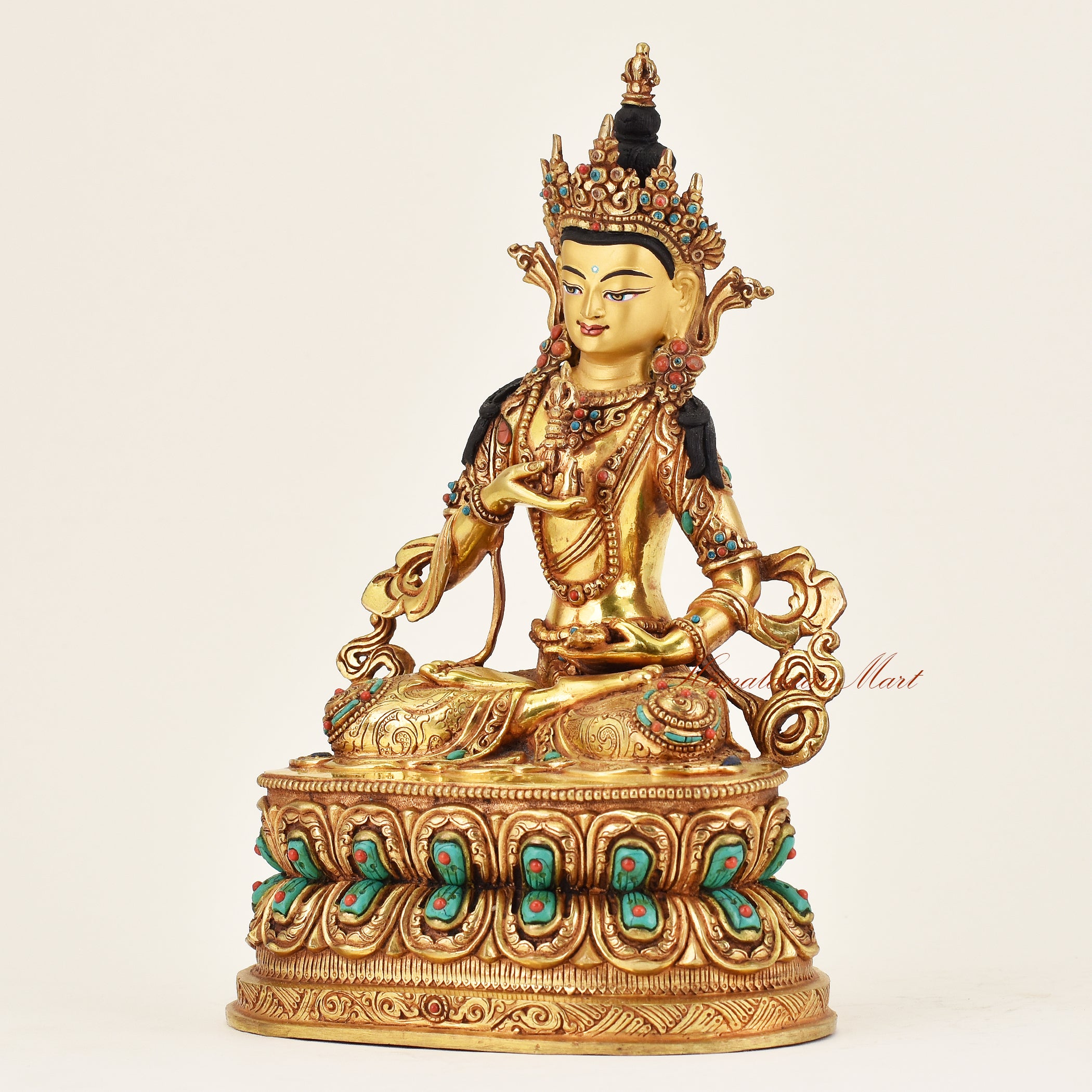 Left angle of handmade Nepalese Vajrasattva Buddha statue with lotus seat and sacred attributes of spiritual purification