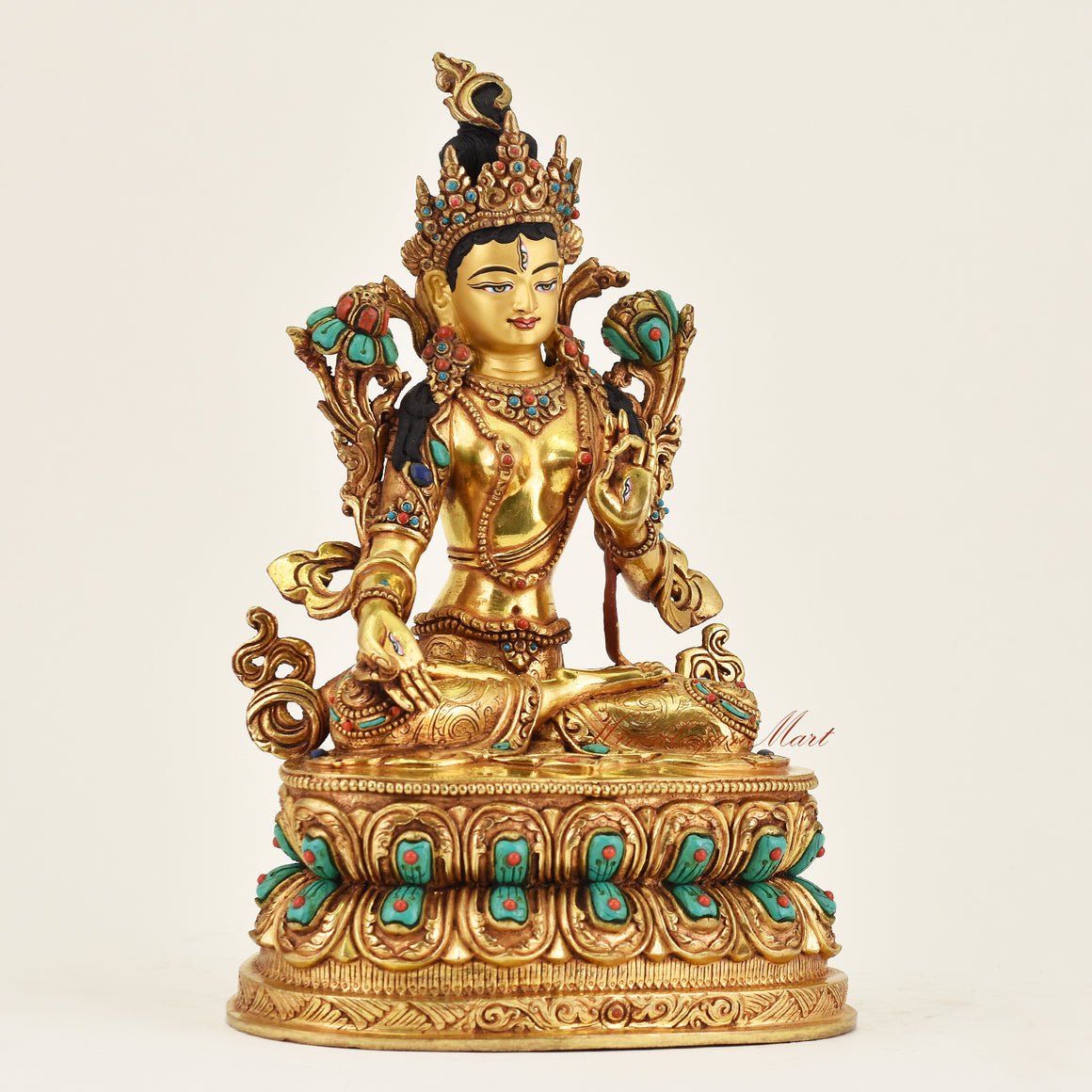 Right side view of handmade Nepalese White Tara statue showing delicate ornaments and lotus seat representing healing and compassion
