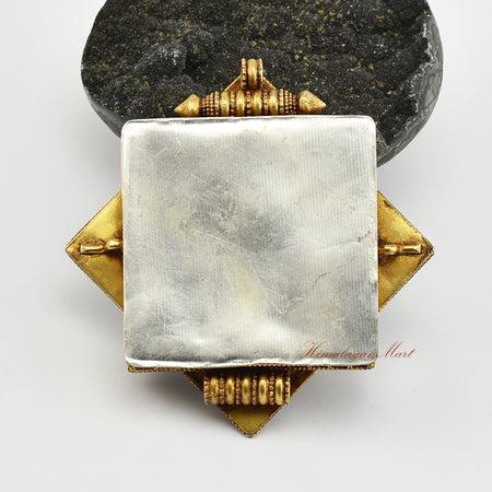 Back view of Handmade Religious Prayer Box Pendant showcasing detailed carvings and traditional Buddhist craftsmanship.