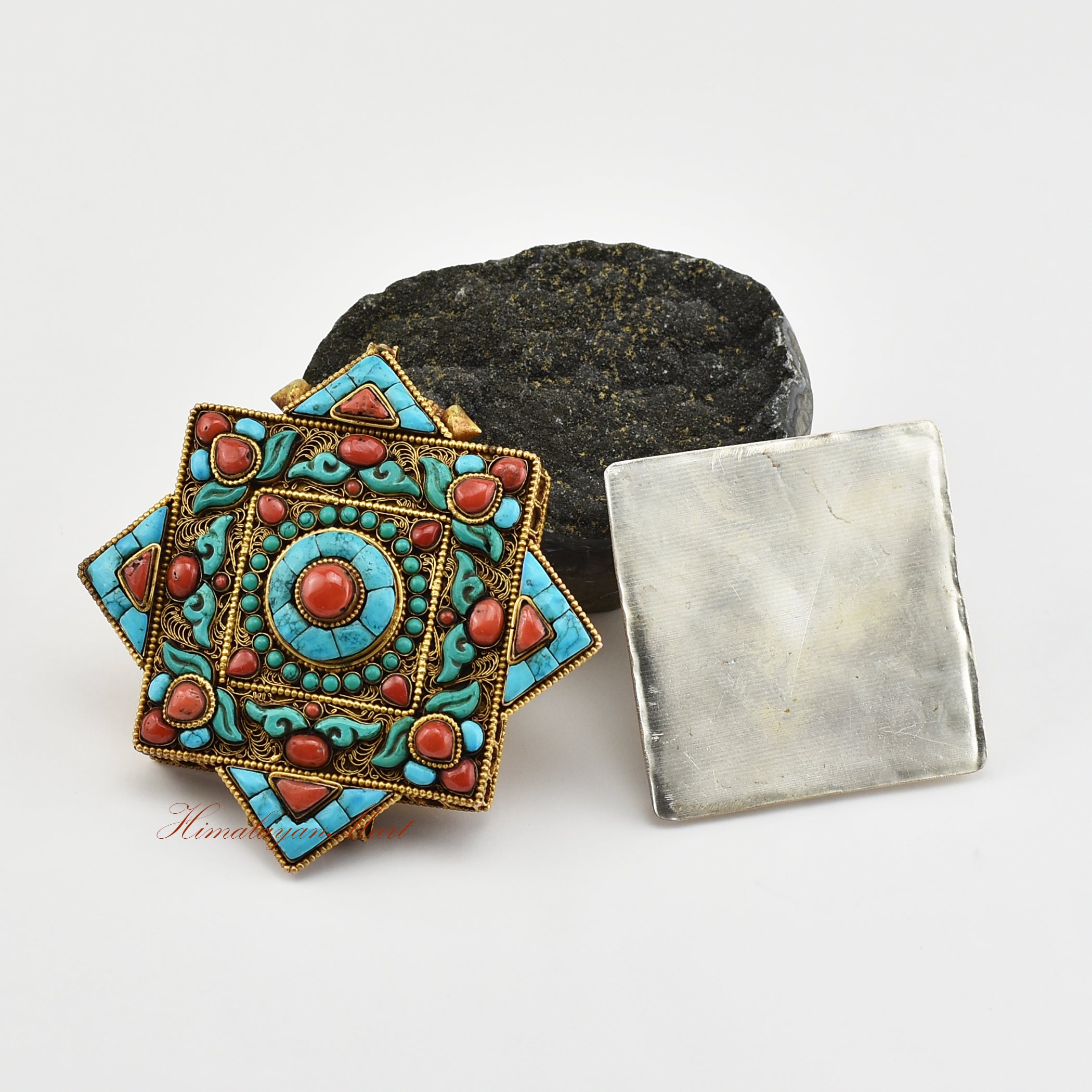 Handmade Religious Prayer Box Pendant opened to reveal its inner chamber for sacred mantras or spiritual relics.