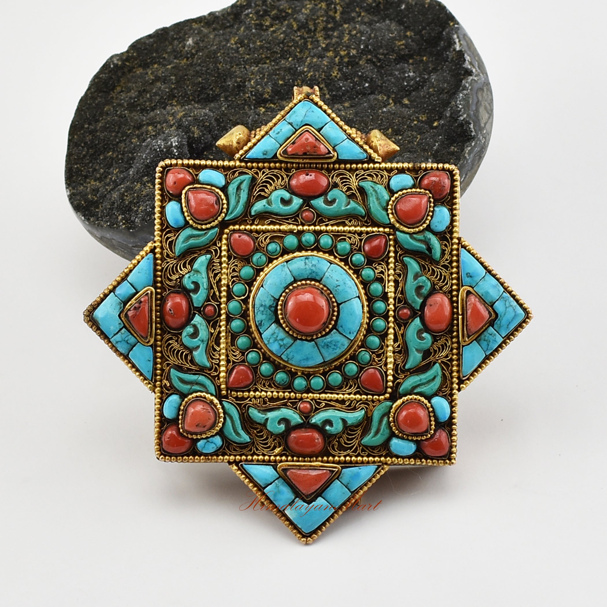 Front view of Handmade Religious Prayer Box Pendant with coral, turquoise, and ornate gold-plated filigree design.