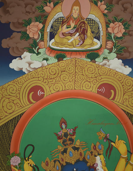 Je Tsongkhapa seated in meditation posture, surrounded by clouds and flowers in Thangka detail.