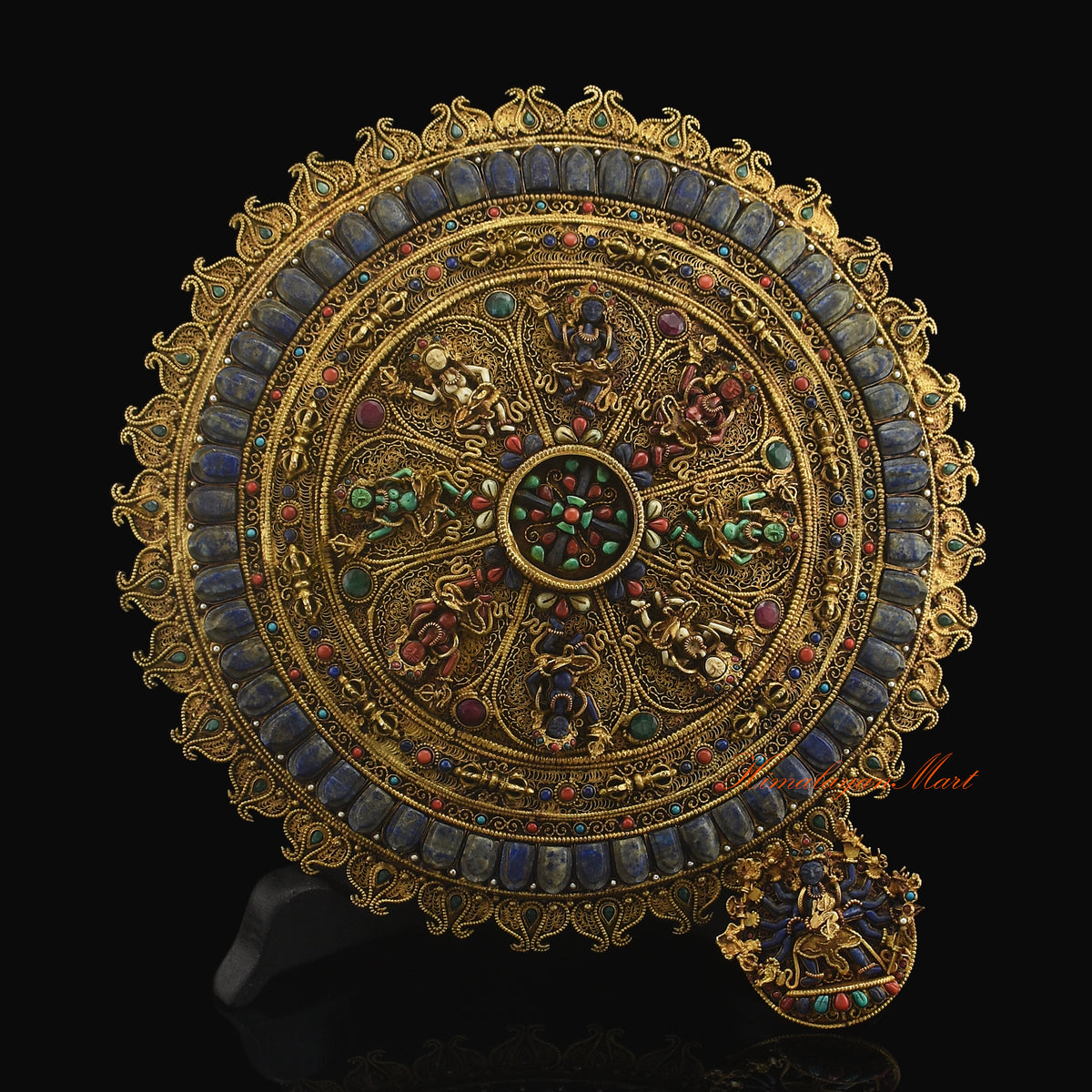 Close up detail of filigree work and gemstone inlay on the Kalachakra Great Bliss Mandala