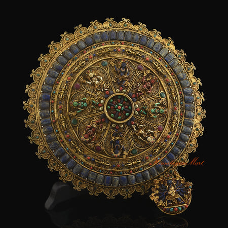 Close up detail of filigree work and gemstone inlay on the Kalachakra Great Bliss Mandala