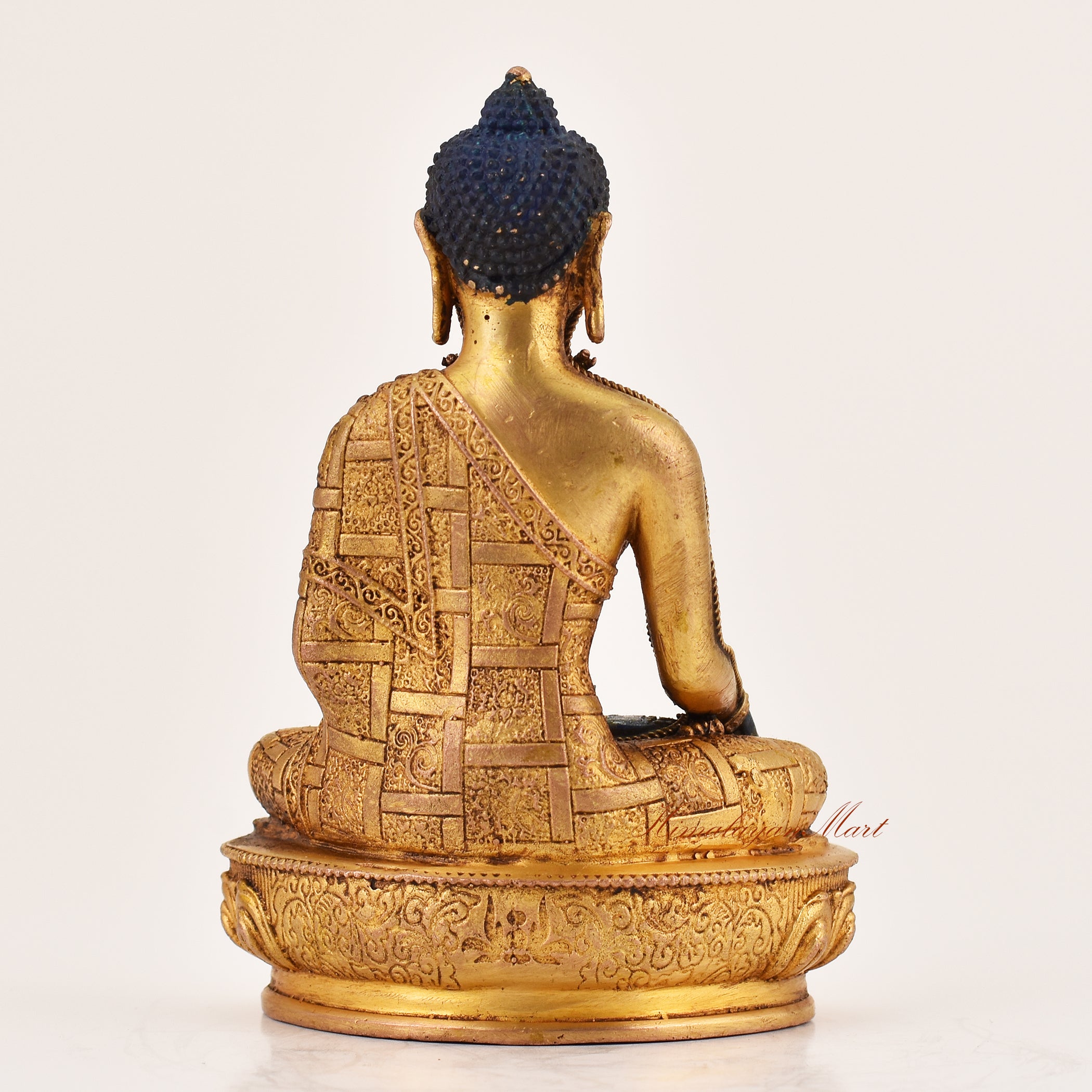 Back view of handcrafted Shakyamuni Buddha statue with lapis inlay, Tibetan Buddhist meditation sculpture for sacred spaces