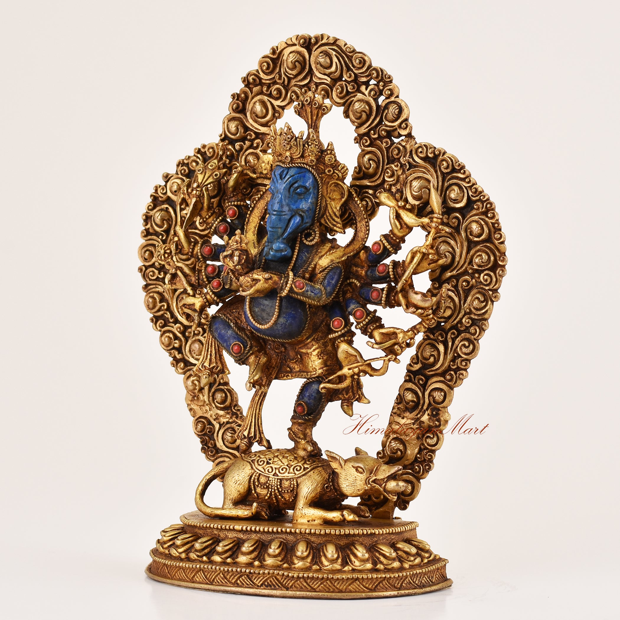 Left-side view of Lapis Inlay Ganesha Statue, coral-accented Hindu and Buddhist spiritual icon.