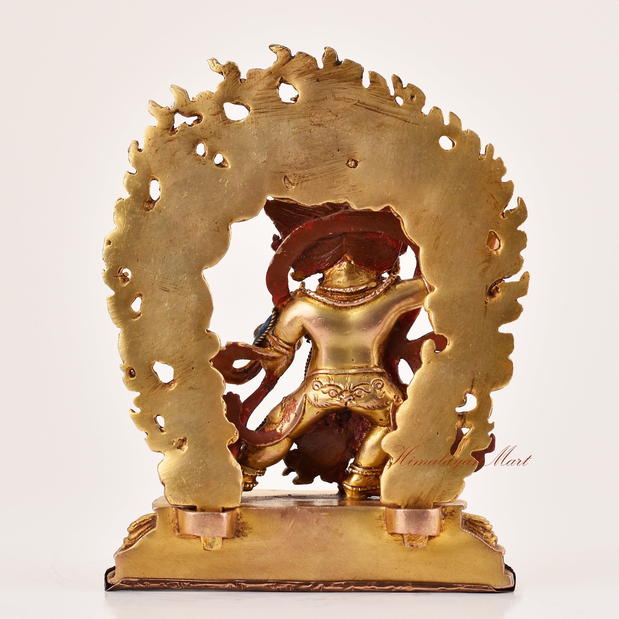 Back view of lapis inlay Vajrapani statue highlighting traditional lost wax copper alloy casting and fine Tibetan Buddhist details.