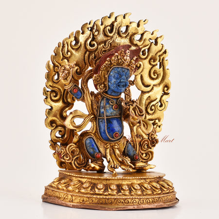 Right side view of lapis inlay Vajrapani statue, handcrafted copper alloy Tibetan Buddhist protector made with traditional lost wax art.