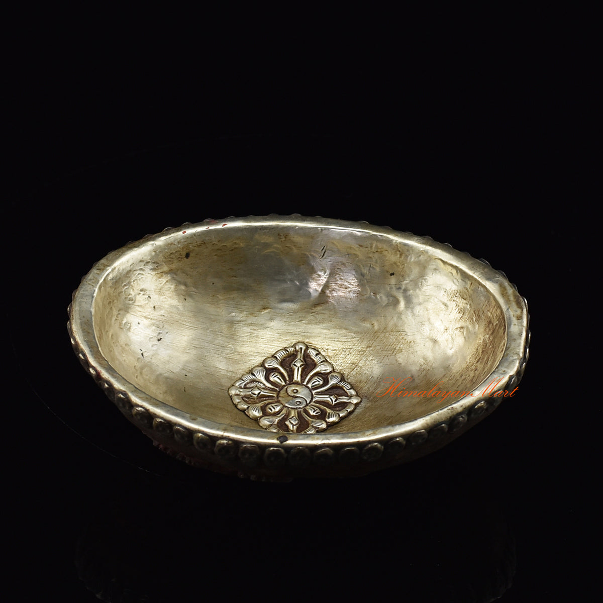 Angled perspective view of the Mahakali Carved Resin Kapala showing full ornate design