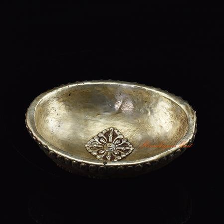 Angled perspective view of the Mahakali Carved Resin Kapala showing full ornate design