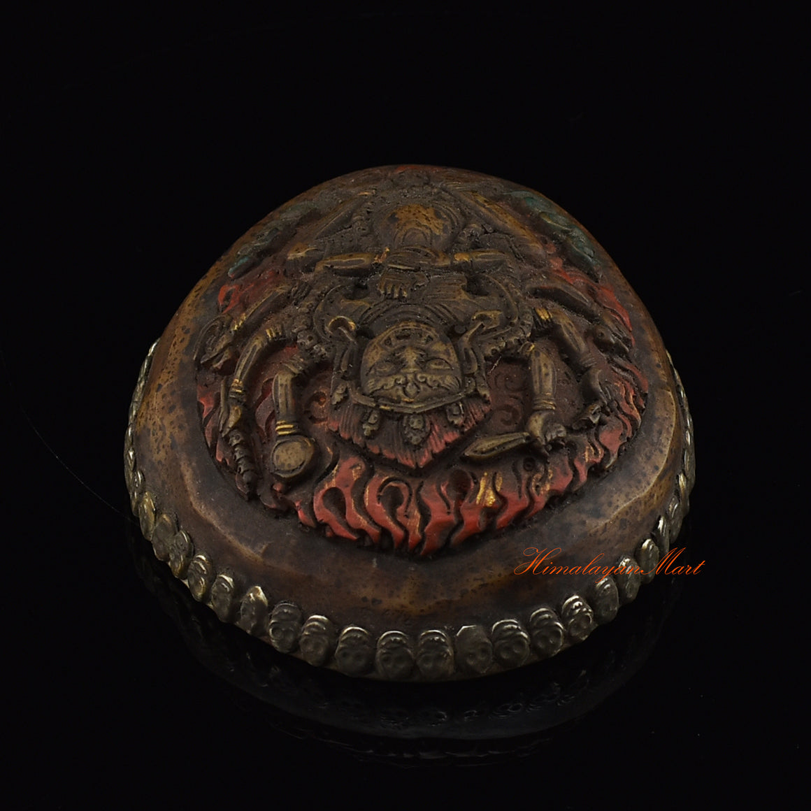 Top view of the Mahakali Carved Resin Kapala highlighting the carved Mahakali imagery