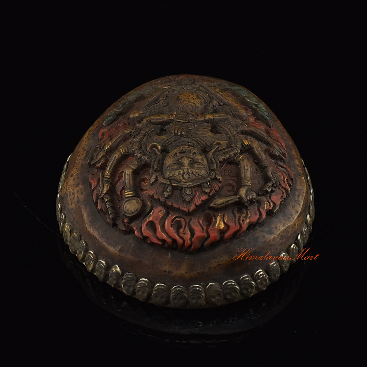 Top view of the Mahakali Carved Resin Kapala highlighting the carved Mahakali imagery