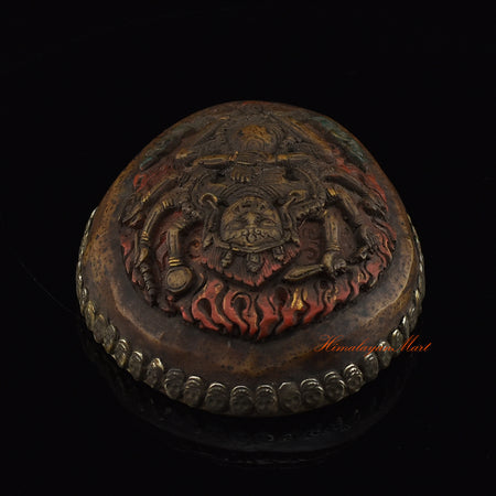 Top view of the Mahakali Carved Resin Kapala highlighting the carved Mahakali imagery