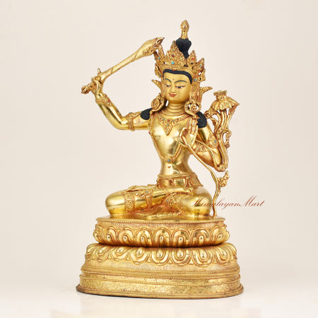 Left side view of Manjushri Buddha Statue with turquoise, coral, and lapis ornamentation