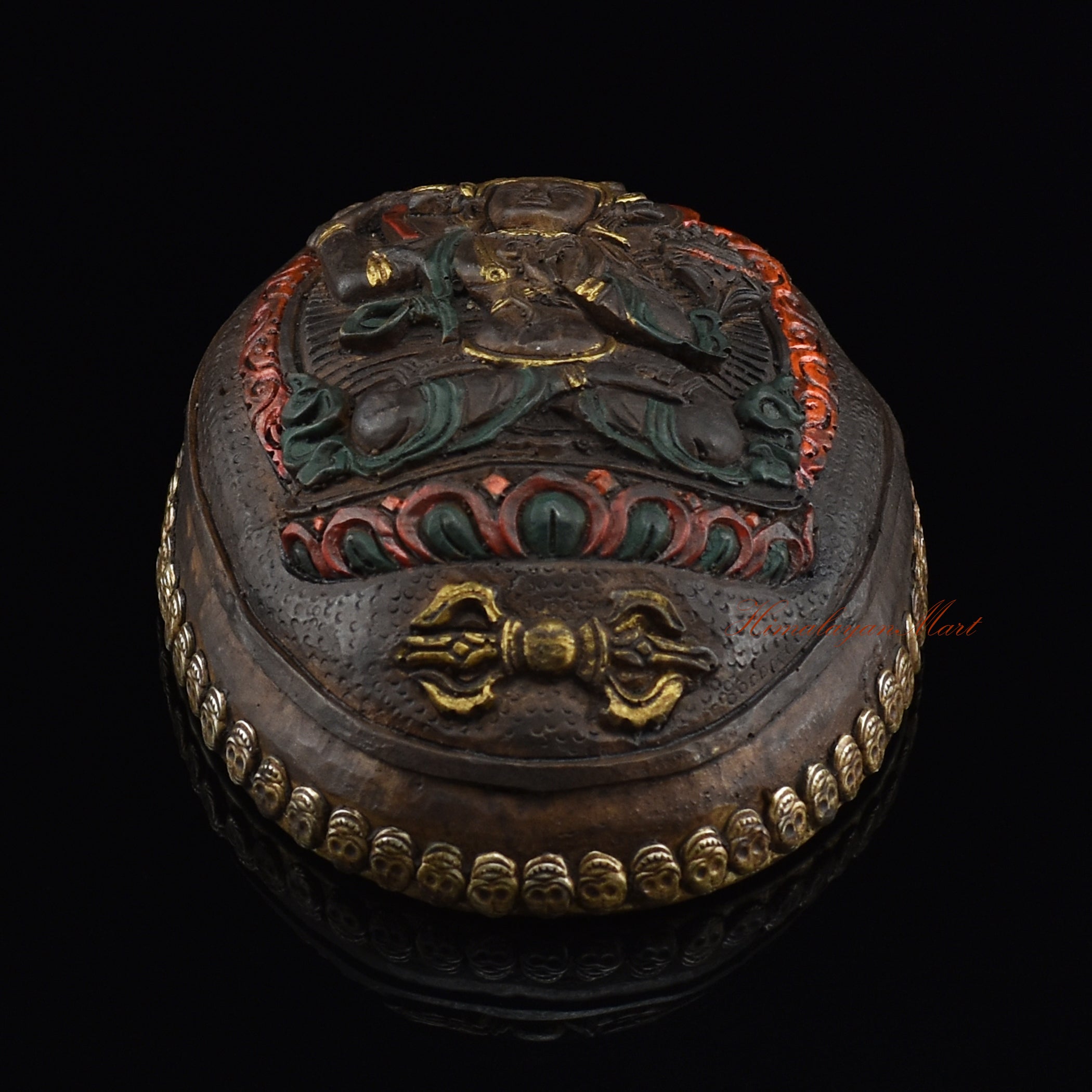 Bottom view of the Manjushri Carved Resin Kapala showing the base and resin craftsmanship
