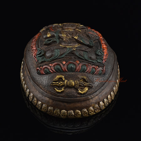 Bottom view of the Manjushri Carved Resin Kapala showing the base and resin craftsmanship