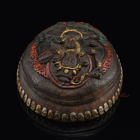 Top view of the Manjushri Carved Resin Kapala displaying the carved Manjushri figure and skull-border design