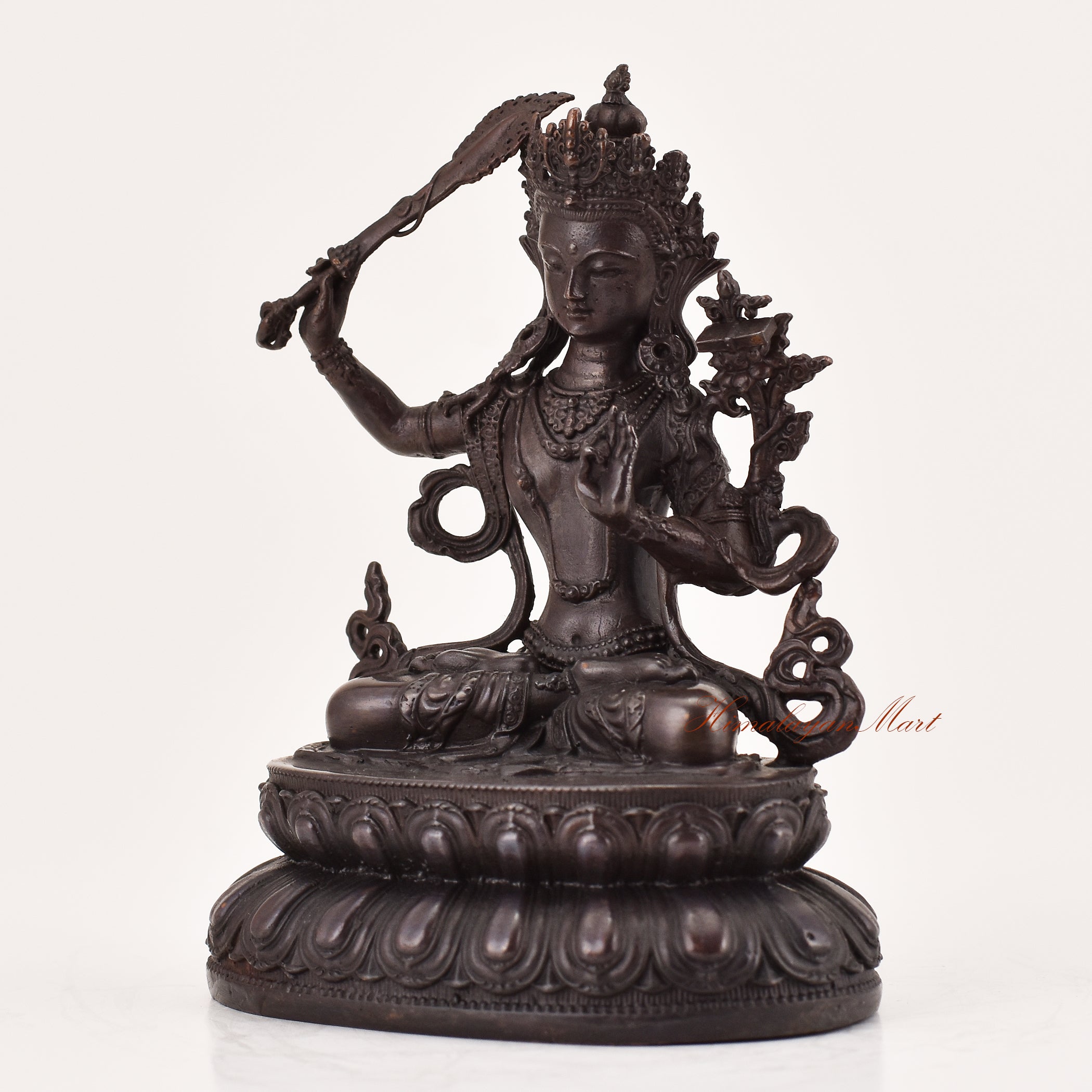 Left-side view of handcrafted Manjushri statue for sale, Tibetan Buddhist meditation and religious sculpture.