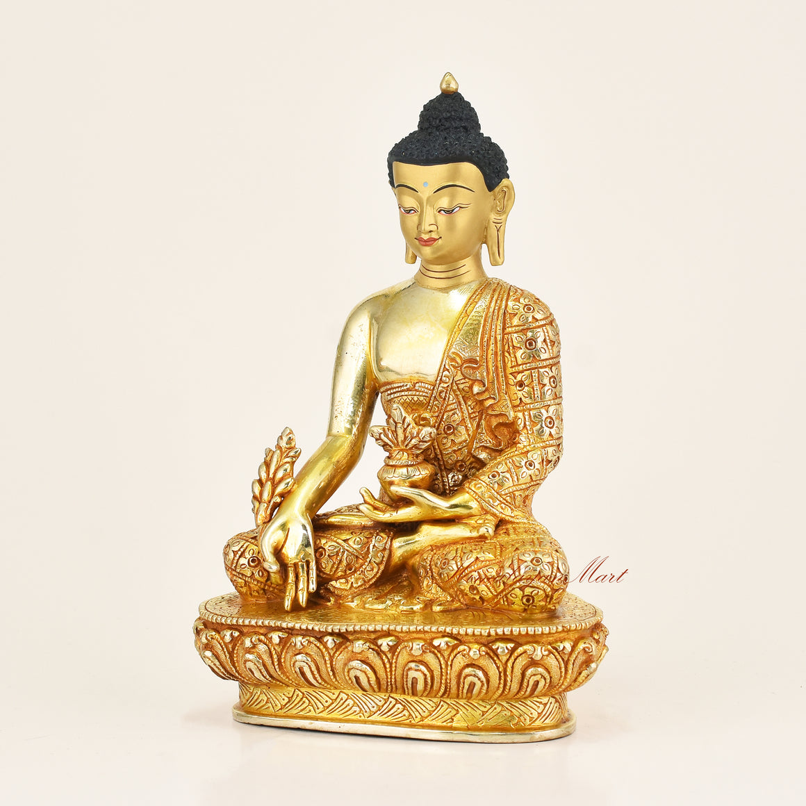 Left side view of Medicine Buddha Handmade Statue showing hand-carved detail