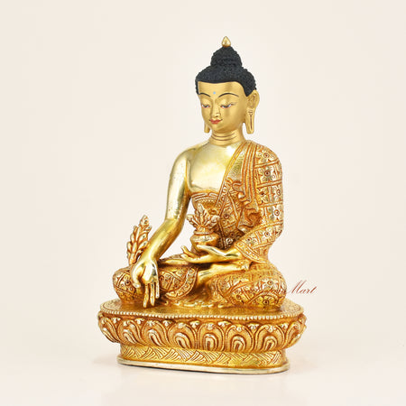 Left side view of Medicine Buddha Handmade Statue showing hand-carved detail