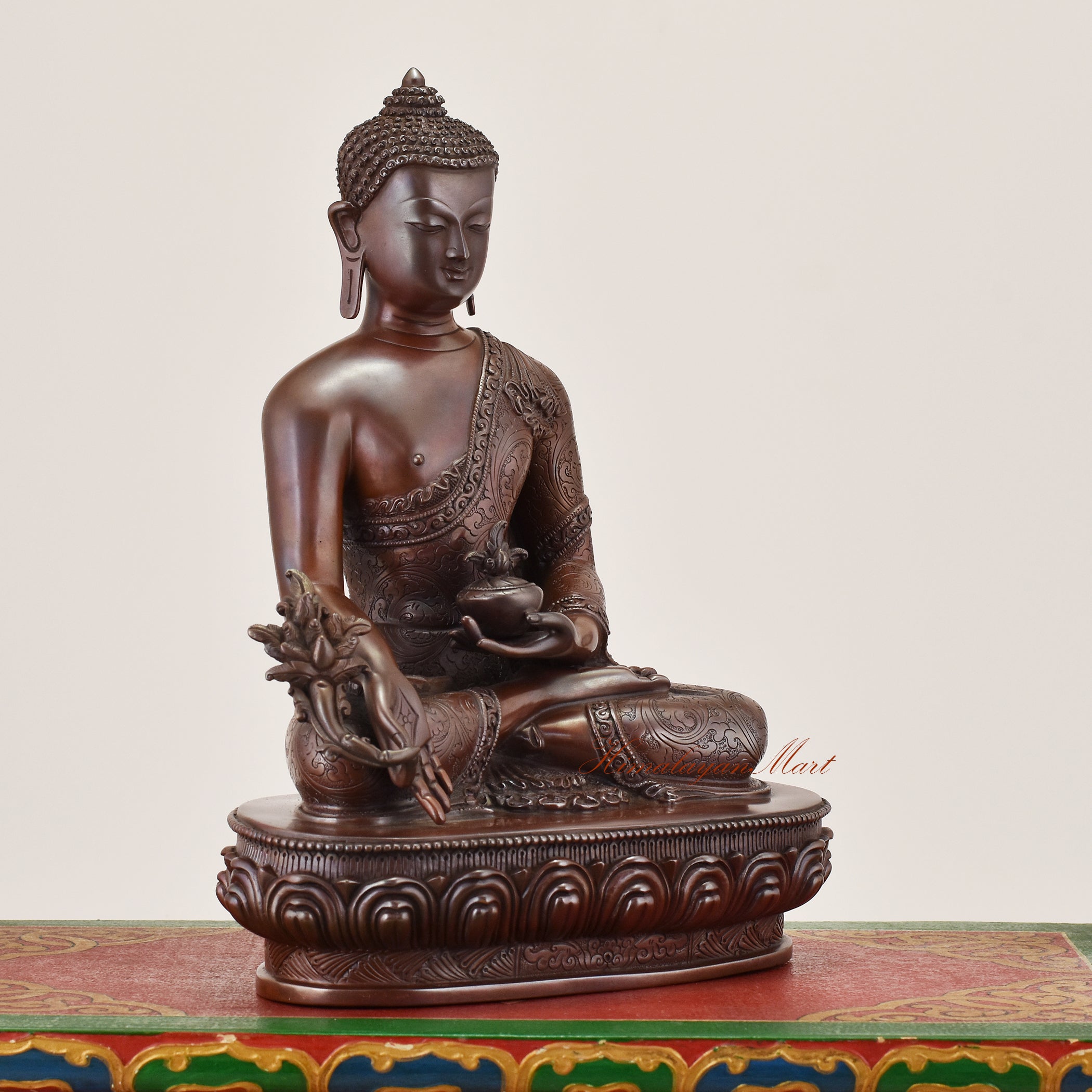 Right-side view of Medicine Buddha Idol sacred copper alloy statue showing refined craftsmanship and serene healing presence