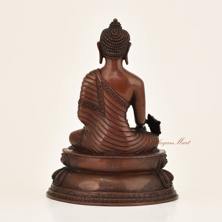 Back view of Medicine Buddha Oxidized Statue crafted using the traditional Lost-Wax Method