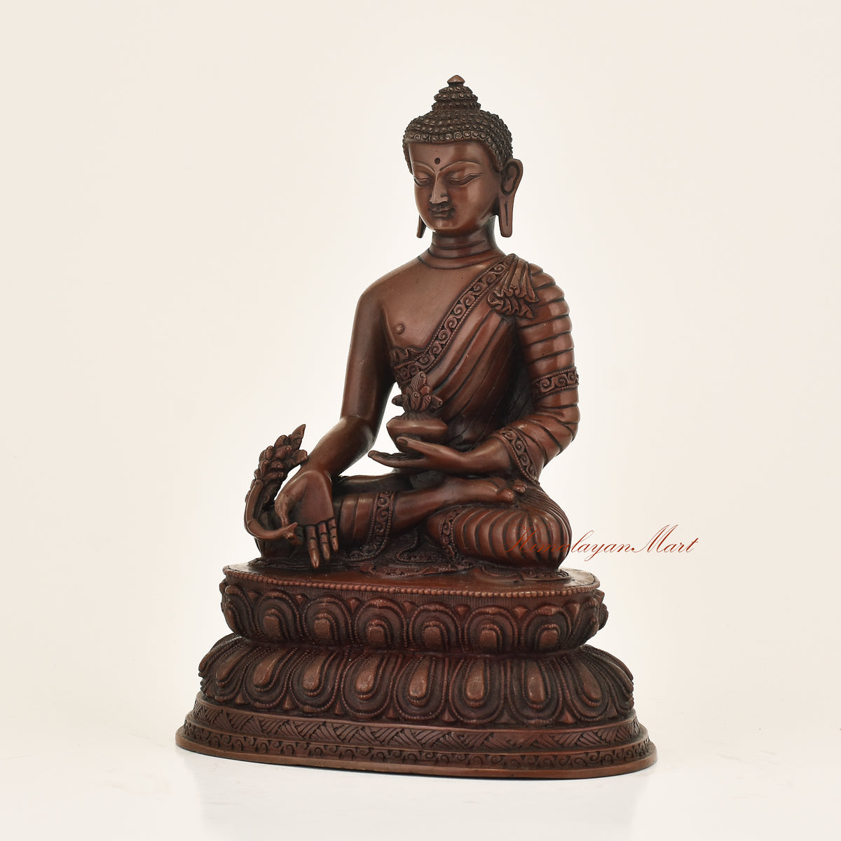 Left side view of Medicine Buddha Oxidized Statue in copper alloy