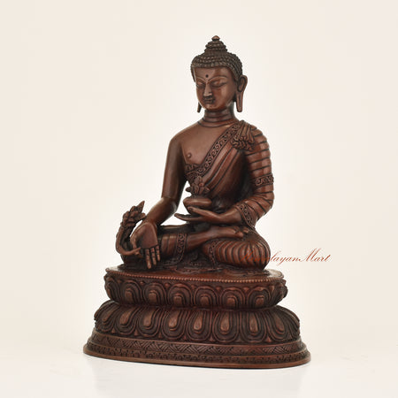 Left side view of Medicine Buddha Oxidized Statue in copper alloy