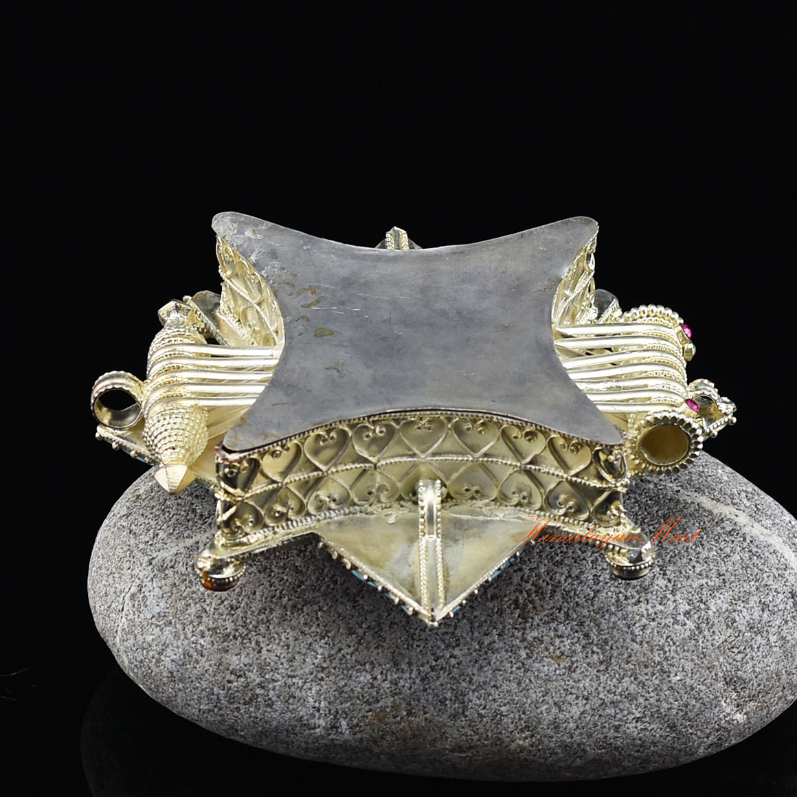 Bottom view of Meditation Prayer Box Jewelry, silver-plated Ghau pendant with hand-set semiprecious stones.