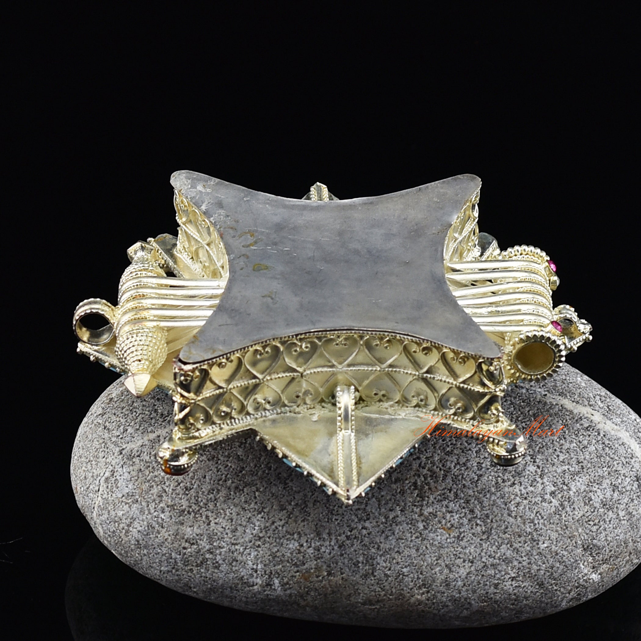 Bottom view of Meditation Prayer Box Jewelry, silver-plated Ghau pendant with hand-set semiprecious stones.