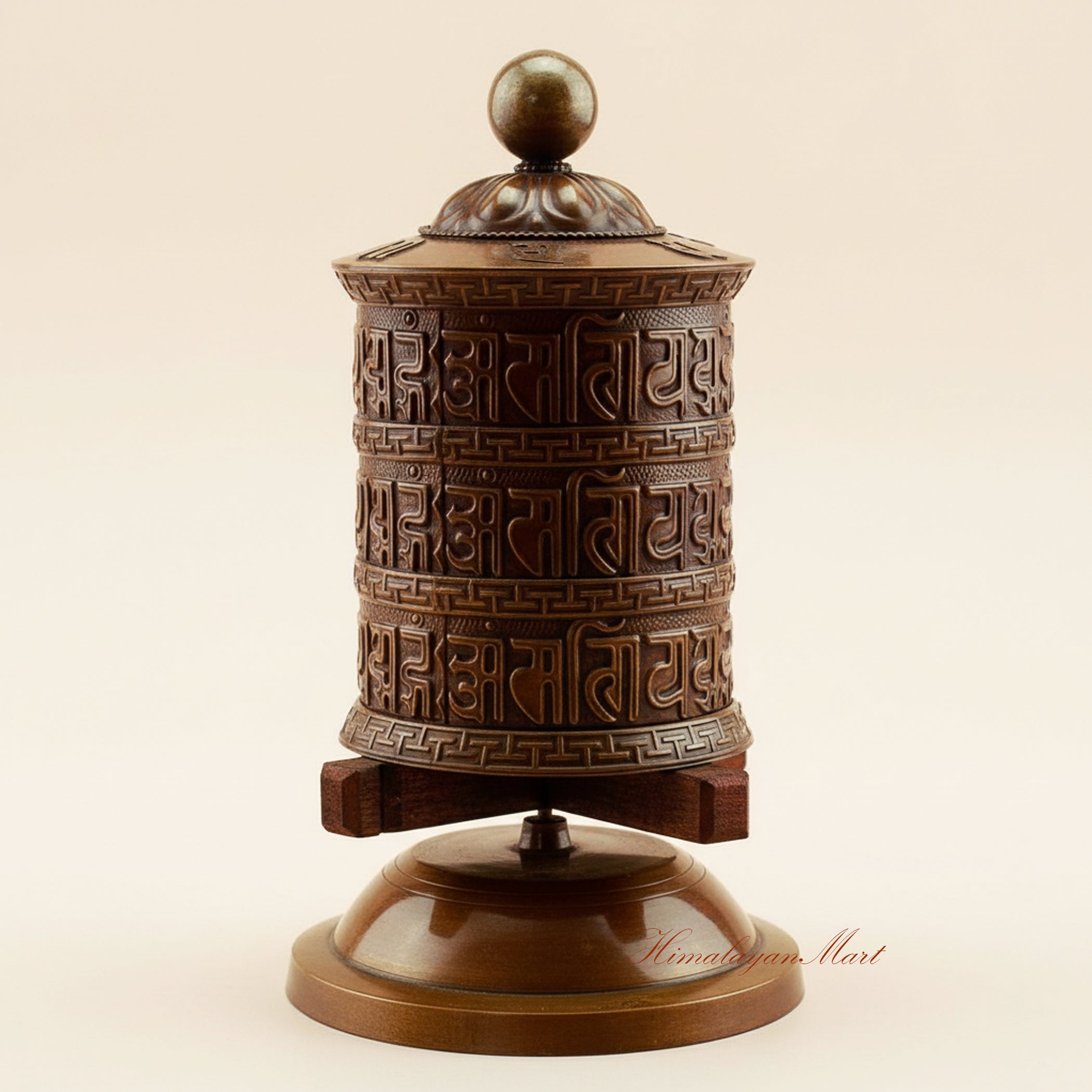 Meditation Tabletop Prayer Wheel handcrafted in copper, brass, and white metal on a wooden base, a sacred Buddhist mantra wheel for daily prayer and meditation.