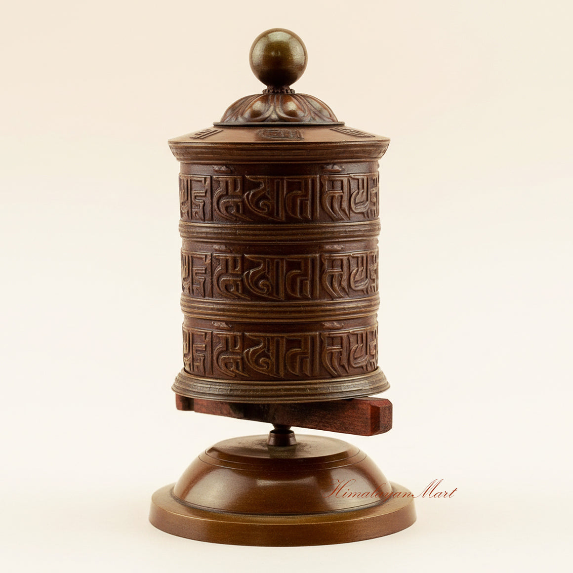 Meditation Tabletop Prayer Wheel spinning during Buddhist prayer practice, symbolizing the release of sacred mantras and blessings.