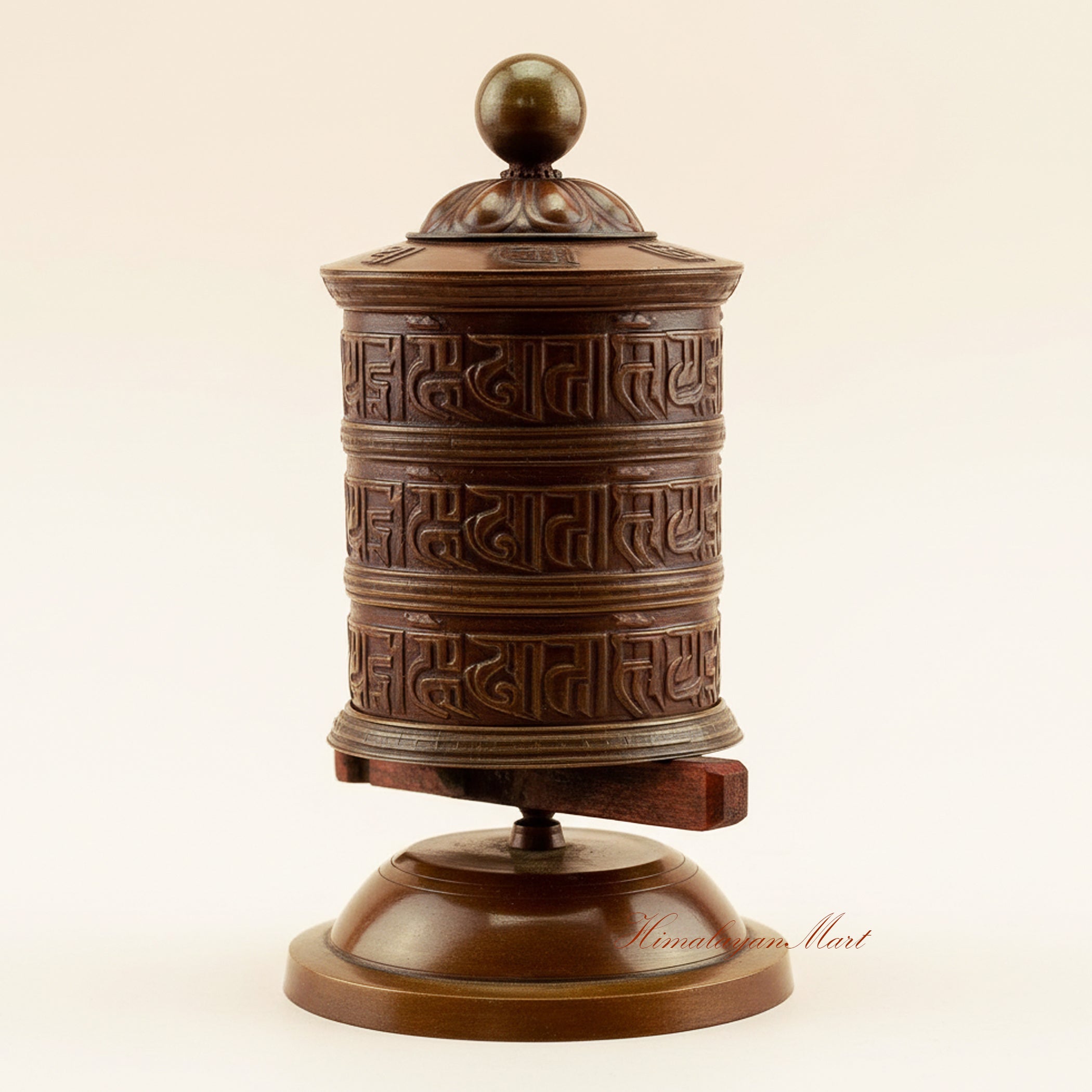 Meditation Tabletop Prayer Wheel spinning during Buddhist prayer practice, symbolizing the release of sacred mantras and blessings.