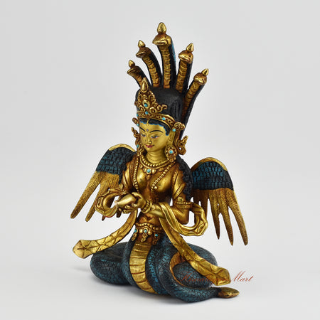 Left side view of Naga Kanya Statue showing hand-carved detail