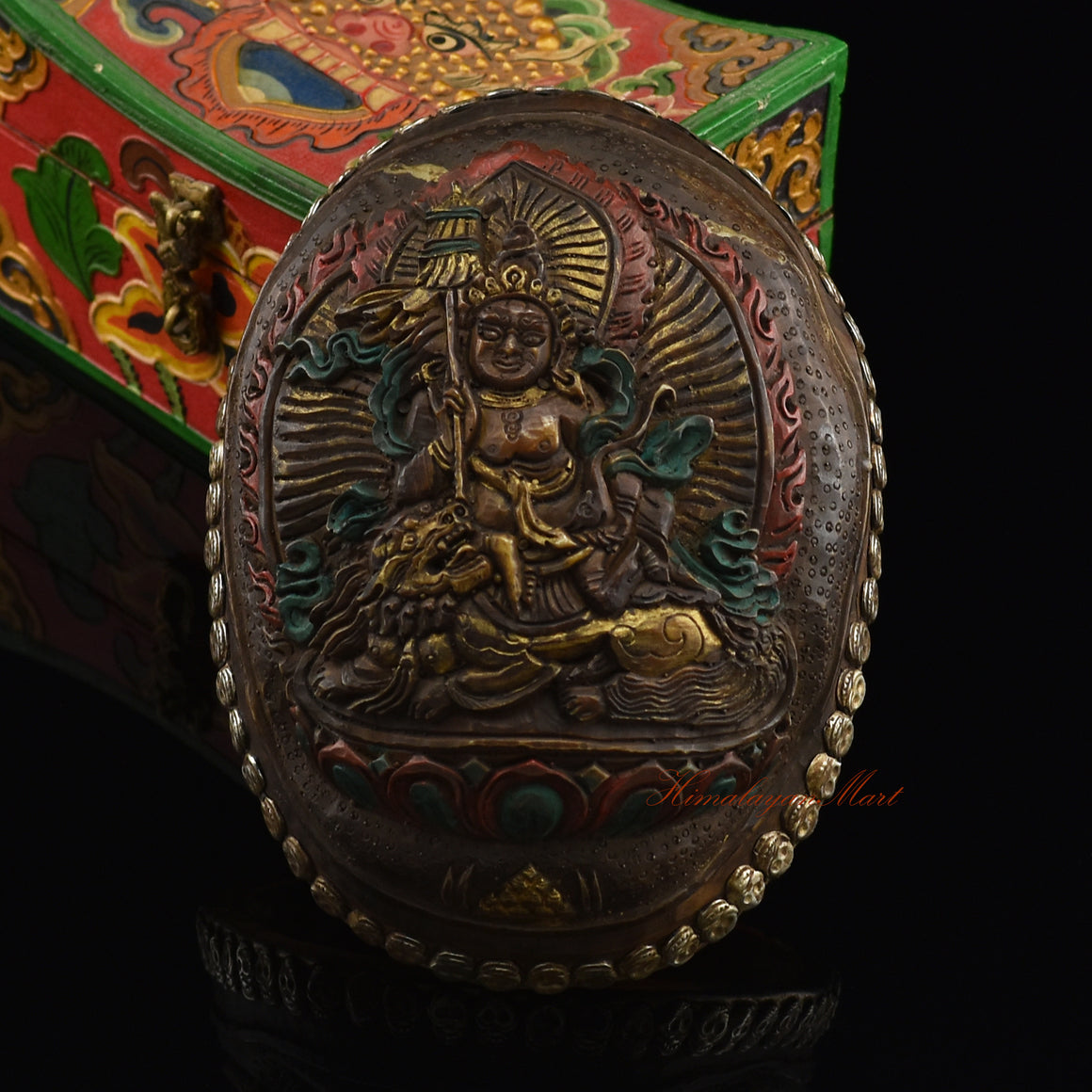 Namtose Vaisravana Resin Kapala with an intricately crafted metal skull border, front view