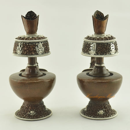 Back view of the Oxidized Copper Bhumba Set, showcasing intricate hand-carved Buddhist motifs and artisanal craftsmanship.