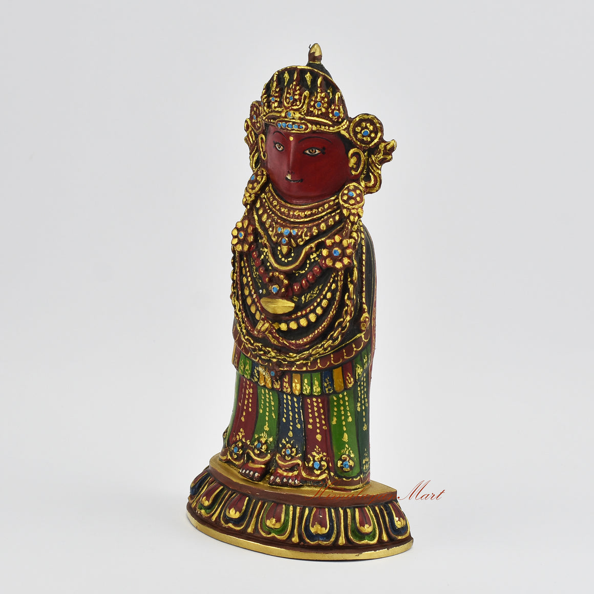 Left side view of a gold gilded Rato Machindranath Statue highlighting traditional Nepalese craftsmanship and form.