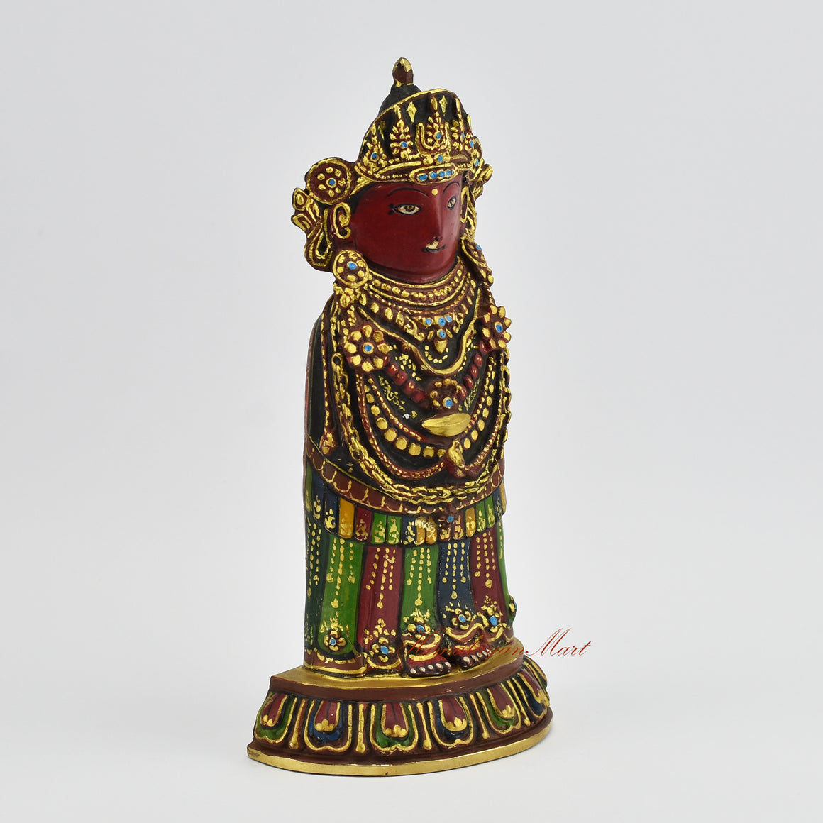 Right side view of a gold gilded Rato Machindranath Statue showing hand carved details and sacred Buddhist artistry.