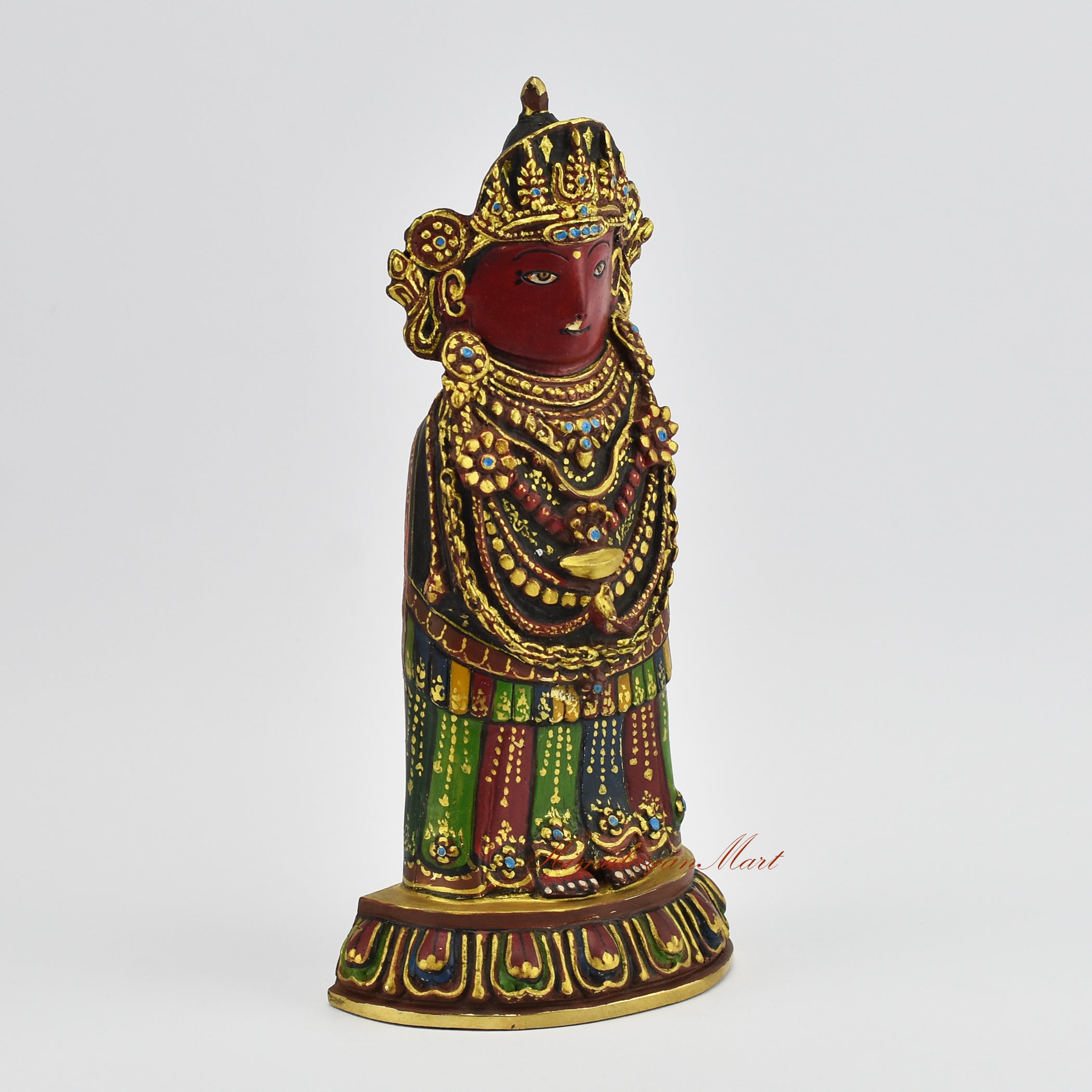 Right side view of a gold gilded Rato Machindranath Statue showing hand carved details and sacred Buddhist artistry.