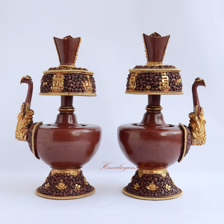 Front outward view of Ritual Purification Bhumba Set highlighting gold gilded copper and gemstone adornments