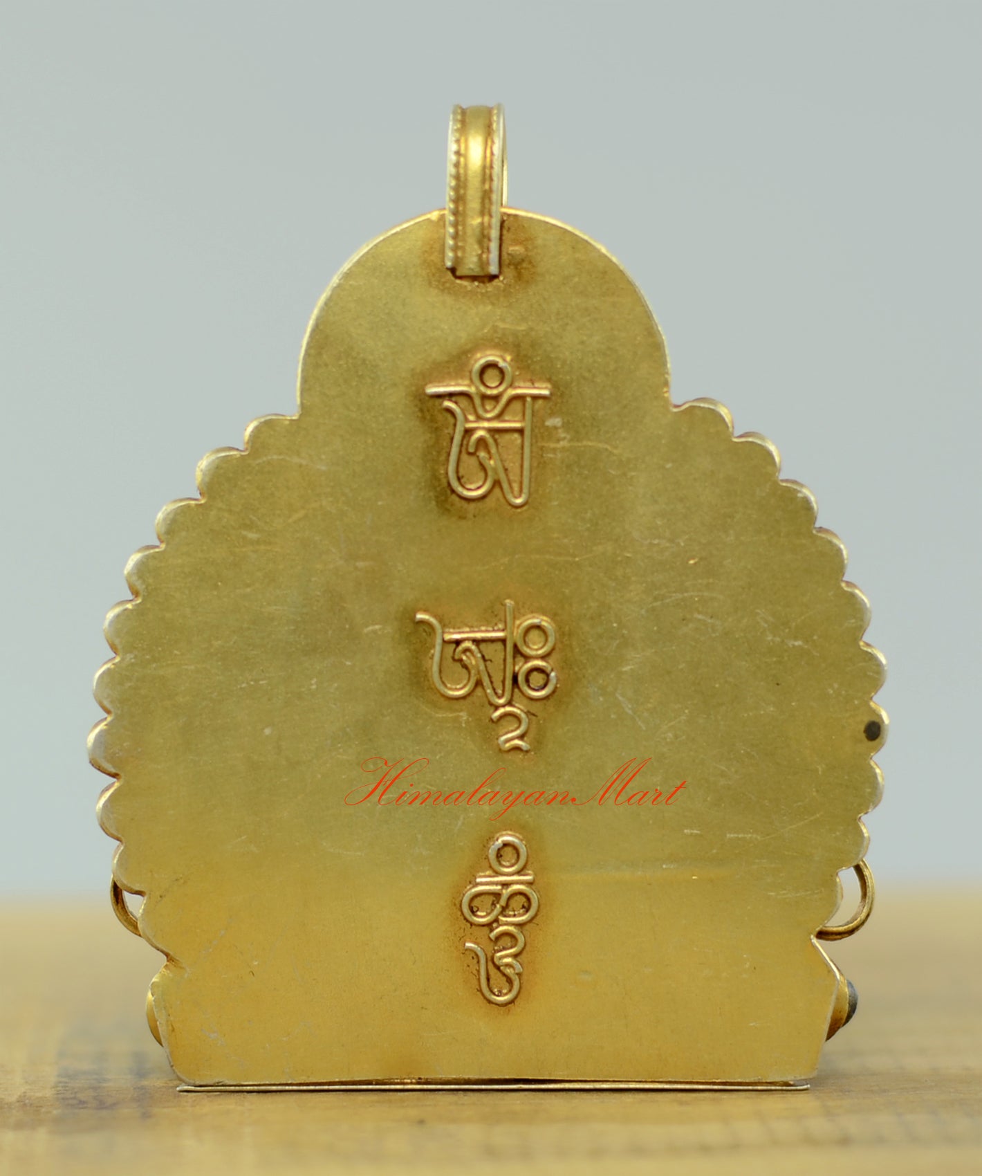 Back view of the Sacred Chenrezig Ghau Pendant featuring traditional siko filigree patterns and silver craftsmanship.