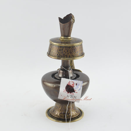 Back view of Sacred Traditional Bhumba showing hand-carved details on an oxidized copper ritual vase