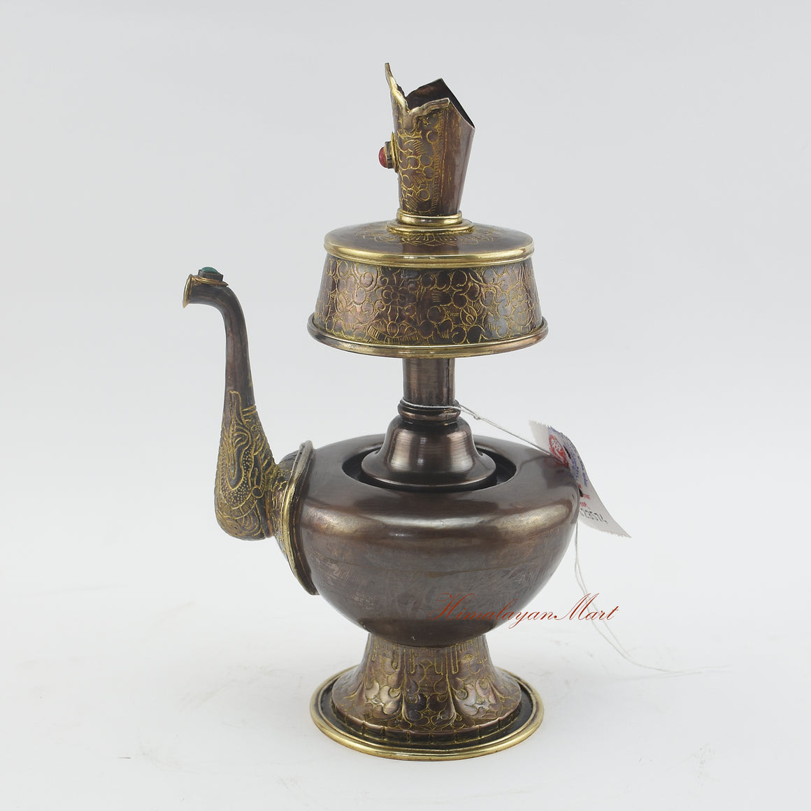 Left side view of Sacred Traditional Bhumba highlighting brass rings and traditional Tibetan carvings