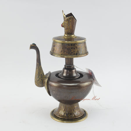 Left side view of Sacred Traditional Bhumba highlighting brass rings and traditional Tibetan carvings