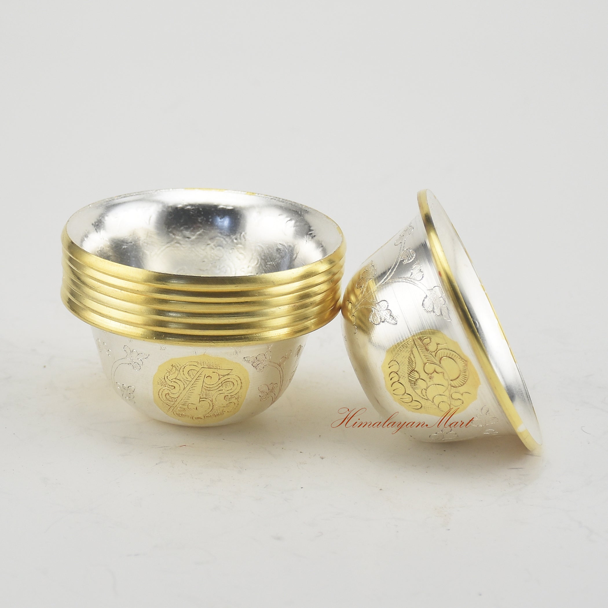 Side view of Seven Tibetan Offering Bowls showing traditional craftsmanship and elegant design.