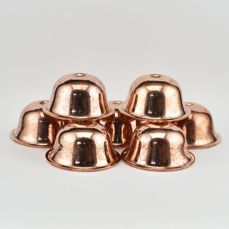 Top view of Seven Water Offering Bowl Set showing traditional Tibetan ritual bowl arrangement